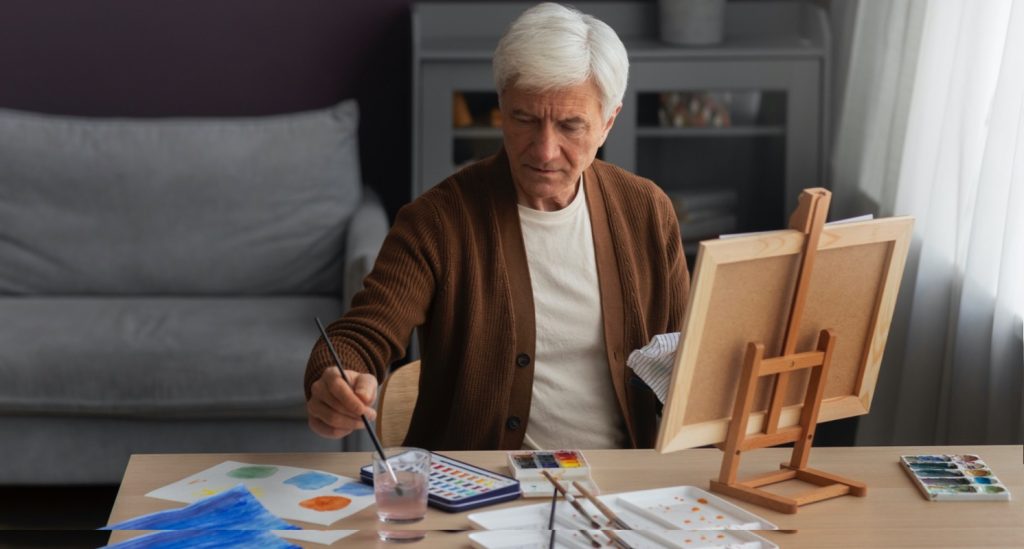 Senior malt ein Bild